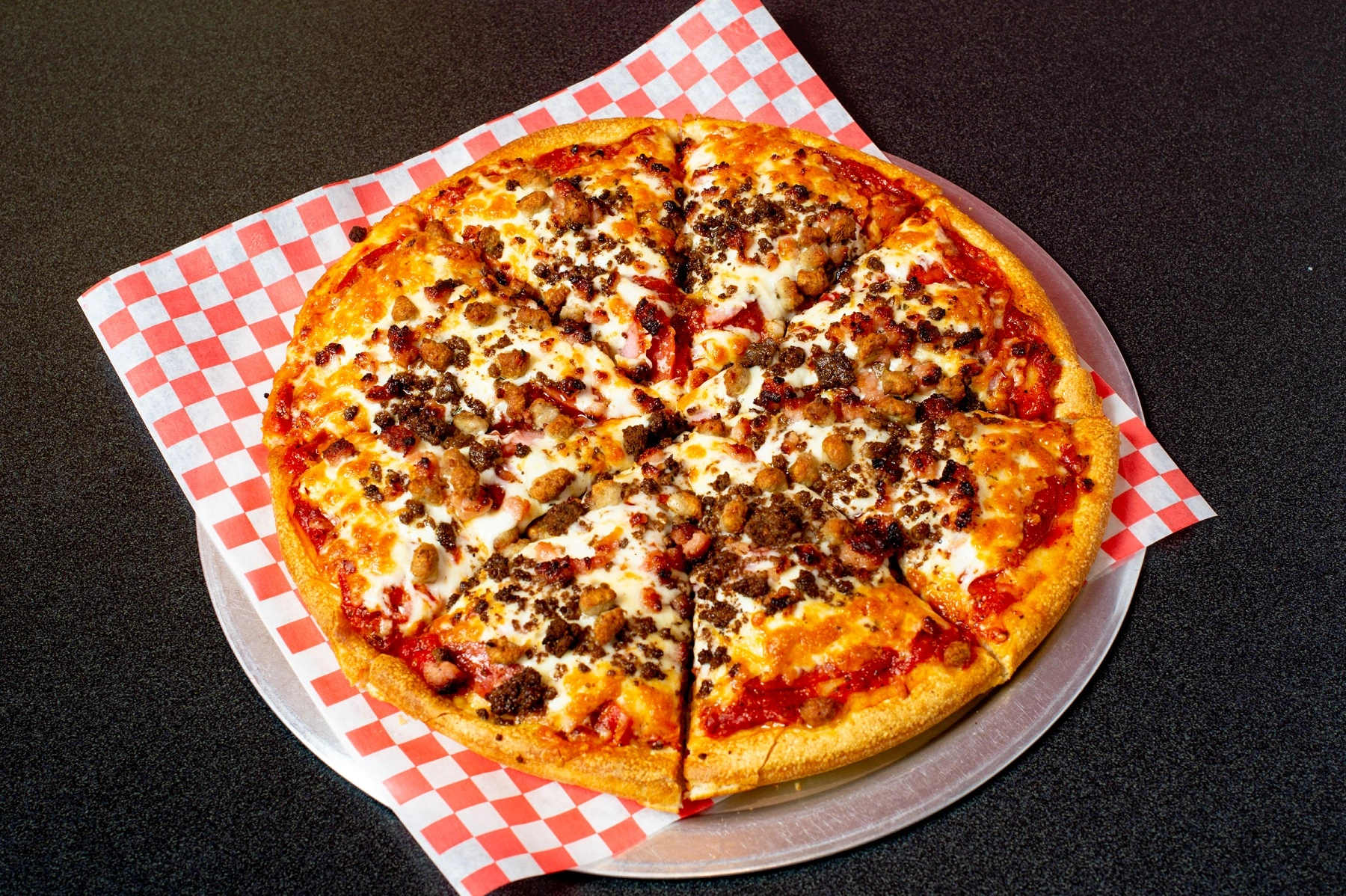 Delicious Meat Lovers Pizza at Firezone Pizza & Donair in Edmonton, AB